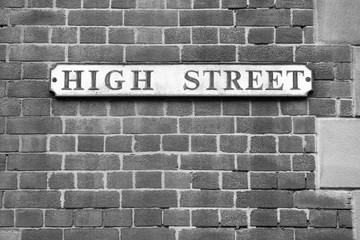 Fototapeta na wymiar High Street, Rotherham. Black and white vintage style.