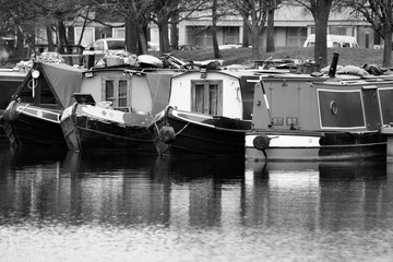 Fototapeta na wymiar Houseboat in Birmingham UK. Black and white vintage style.