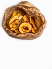 Tasty dried apples chips isolated on white background