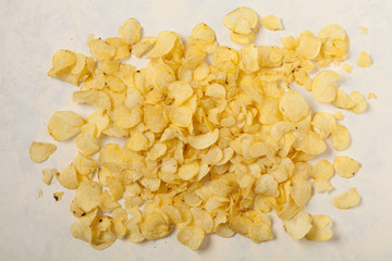 Background made of chips, prays and/or popcorn. Top view.