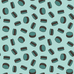 Vector seamless cookie pattern in mint. Simple doodle macaroon cookie made into repeat. Great for background, wallpaper, wrapping paper, packaging, fashion, restaurant, cafe.