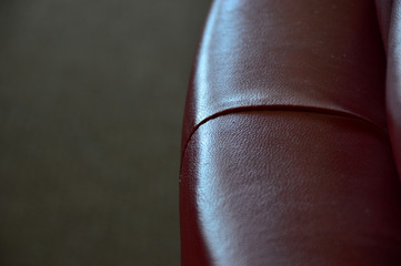 back of red leather sofa