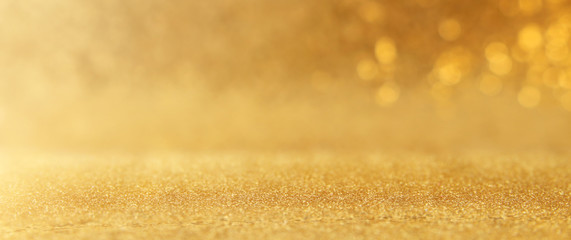 background of gold glitter lights. de focused. banner