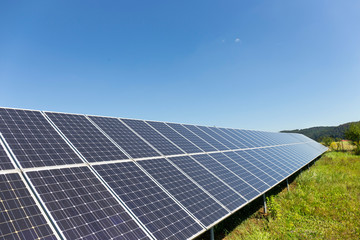 Solar Power Station on the summer Meadow 