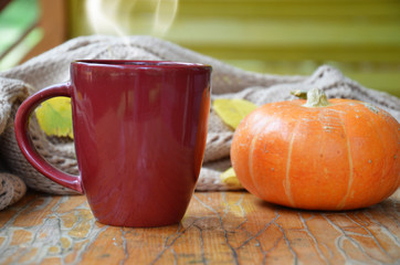 Pumpkin Spice Latte. Cup of Latte with Seasonal Autumn Spices, Cookies and Fall Decor. Traditional Coffee Drink for Autumn Holidays.