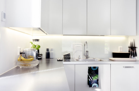 Scandinavian Modern Kitchen With White Details, Minimalistic Interior Design. Finnish Design Style - Clean And Simple.