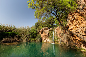 Pego do Inferno waterfall in Tavira, Portugal - Algarve Beautiful green lagoon