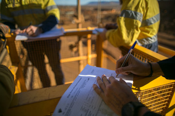 Rope access miner supervisor sigh of JSA risk assessment permit to work on site prior to performing...
