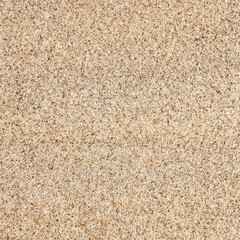 Fototapeta na wymiar Beautiful sea sand close-up. Summer time wallpaper