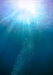 Underwaterphoto of beautiful sunbeams