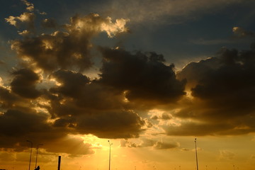 Sunset background and sun beam on the open seaGold sunset light on the ocean.