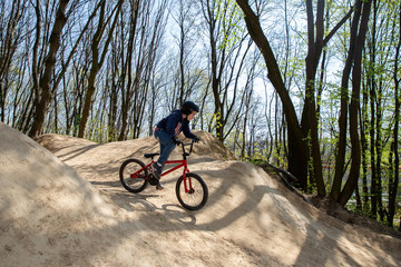 cyclist in the mountain, cyclist riding mountain bike in the forest