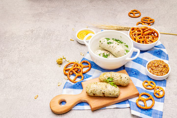Oktoberfest set. White sausage weisswurst, pretzels, mustard, spikelets of grain, hop
