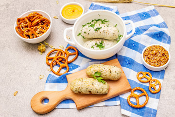 Oktoberfest set. White sausage weisswurst, pretzels, mustard, spikelets of grain, hop
