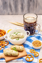 Oktoberfest set. Dark beer, weisswurst, pretzels, mustard, spikelets of grain, hop