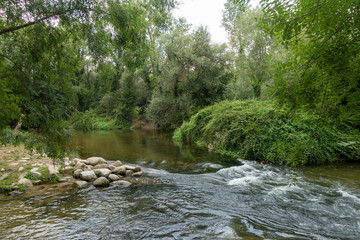 Naklejka na ściany i meble The river ter next to the greenway of Carrilet, Girona