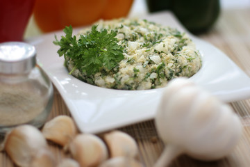 Egg paste for sandwiches served with garlic and parsley