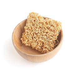 Instant noodles in a wooden bowl Isolated on white