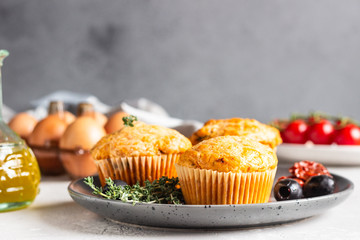 Savory muffins with sun dried tomatoes and olives.