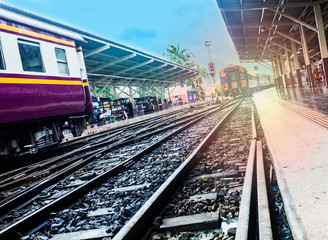 train station with train waiting for tourists to travel out of the province on weekends to relax