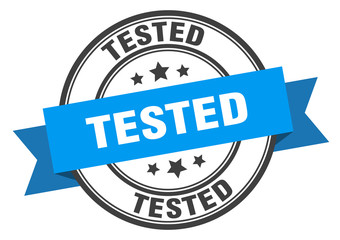 Fototapeta premium tested label. tested blue band sign. tested