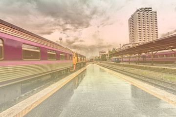 Obraz premium train station with train waiting for tourists to travel out of the province on weekends to relax