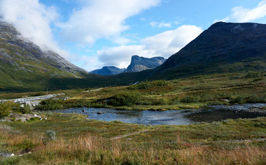 Naklejka na ściany i meble longfjellelva mountain stream near trollstigen in reinheimen norway