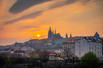 Fototapeta na wymiar Scenic Panorama of the Old Town Architecture with Vltava River, Charles Bridge and St.Vitus Cathedral in Prague, Czech Republic, Sunset Time