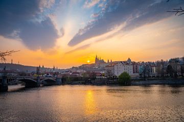 Scenic Panorama of the Old Town Architecture with Vltava River, Charles Bridge and St.Vitus Cathedral in Prague, Czech Republic, Sunset Time