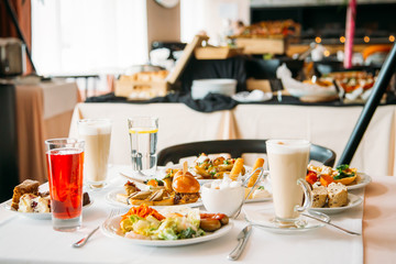 Breakfast Buffet Concept, Breakfast Time in Luxury Hotel, Brunch with Family in Restaurant, Table with Plates of Food for Breakfast - Image