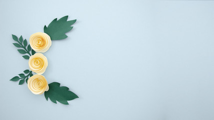 Blue background with orange flowers frame and copy space