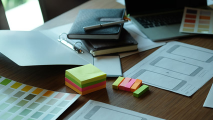 Working desk of programmer developing  mobile application User experience UX UI concept.
