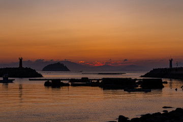 Fototapeta na wymiar a beautiful scene of before sunrise at a harbor, Jin-do island, south Korea