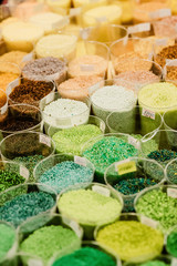 Colorful glass beads pattern. Beading. Variety of color beads in handmade shop