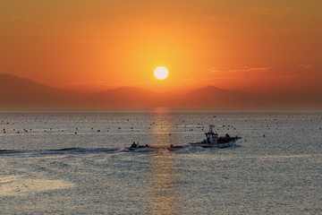 Fototapeta premium a beautiful scene of sunrise at a harbor, Jin-do island, south Korea