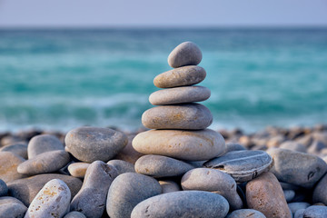 Zen balanced stones stack on beach