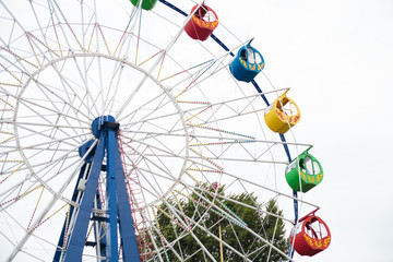 Ferris wheel against the sky. children attractions. Leisure, carousel