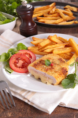 cordon bleu with french fries and salad