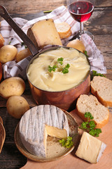 aligot, french gastronomy with cheese, potato and red wine