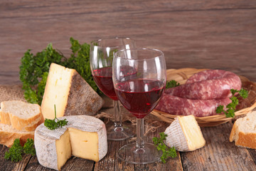 red wine with cheese, sausage and bread
