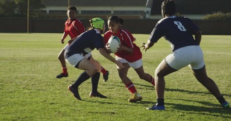 Young adult female rugby match - Powered by Adobe