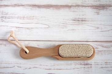 Pumice on a wooden background, zero waste concept. Copy space
