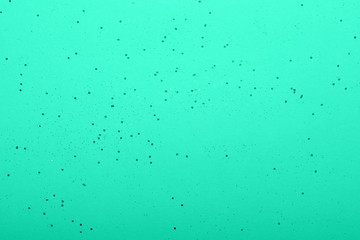 Glitter on the mint background