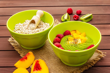 Oatmeal bowl with fresh berries and fruits