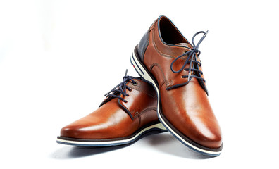 luxurious male brown and blue leather shoes isolated on a white