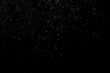 Abstract glitter background, snow imitation in silver, on black
