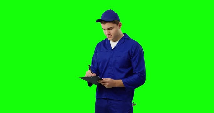 Handyman in blue overalls