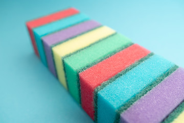 sponges for dishwashing isolated on blue background