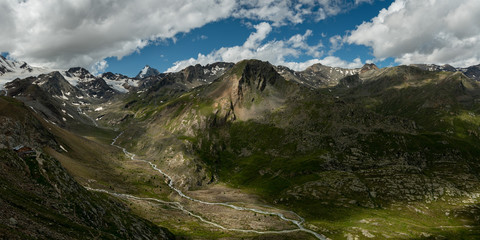 Panorama of Martell valley in South Tyrol on a partly cloudy day in summer