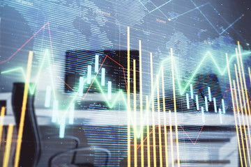 Stock market chart with globe hologram and desktop office computer background. Multi exposure. Concept of financial analysis.